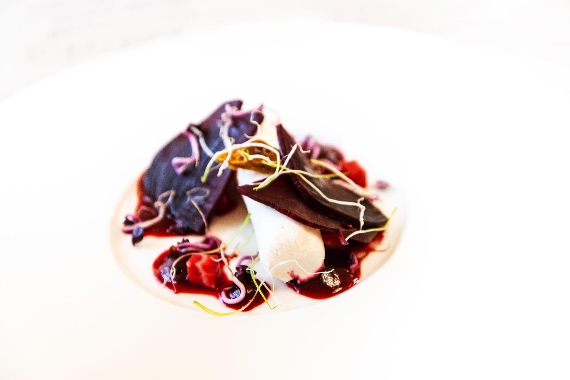 Close-up gourmet appetizer on ceramic